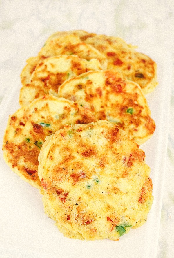 white plate with savory pizza pancakes on it
