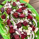 green platter with roast beetroot salad with feta