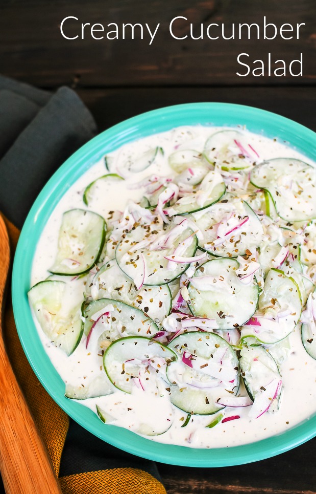 turquoise bowl with creamy cucumber salad with mayo