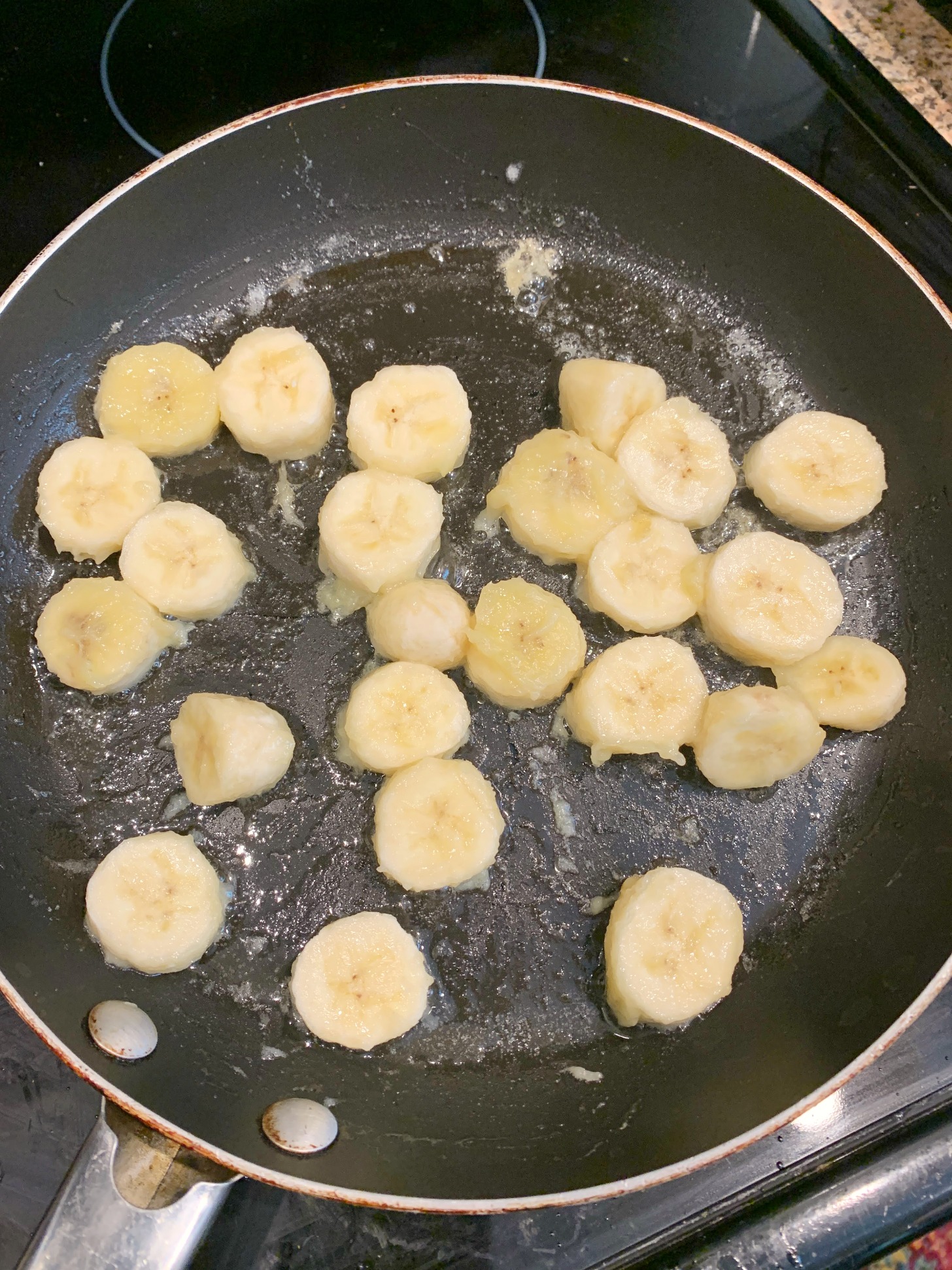 banana slices in a frying pan