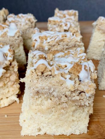 up close shot of a slice of New York Crumb Coffee Cake to show the glaze on top