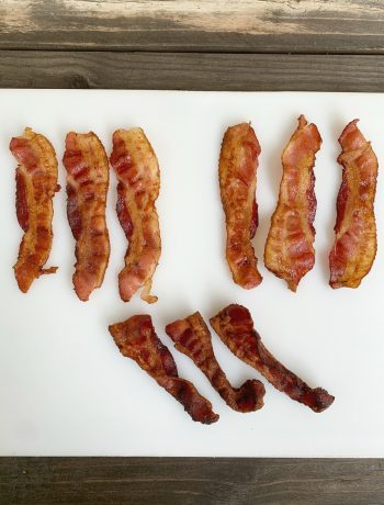 bacon on a white cutting board in groups of 3